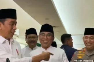 Presiden Jokowi saat bersama Kapolri Komjen Pol.Listyo Sigit Prabowo. (Foto: Warta Kota)