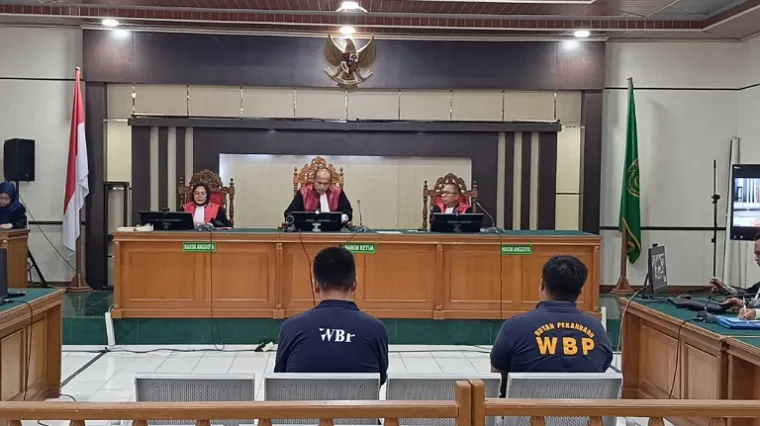 Sidang Yose Saputra, mantan Ketua LAMR Kota Pekanbaru dan Ade Siswanto, mantan Bendahara LAMR Pekanbaru