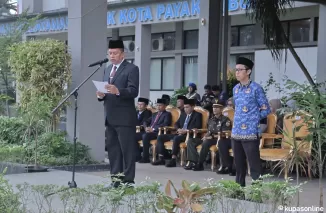 Asisten II Elzadaswarman, S.Km., MPPM pada upacara peringatan Harkitnas ke 116, digelar di halaman kantor Balaikota Payakumbuh, Senin 20 Mei 2924.