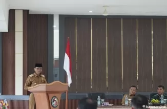 Bupati Safaruddin saat membuka rapat Pelaksanaan Laporan Akhir Kegiatan GTRA kabupaten Limapuluh Kota, di aula kantor bupati, Sarilamak, Selasa, 3 Desember 2024.