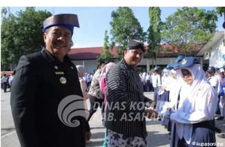 Bupati Asahan Gunakan Tanjak Melayu Pimpin Hardiknas di Kabupaten Asahan
