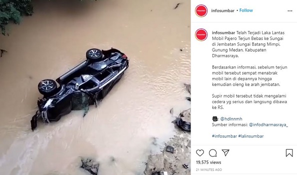 Mobil Pajero terjun bebas di jembatan Gunung Medan, Dharmasraya, Minggu (3/1/2021). (Instagram @infosumbar)