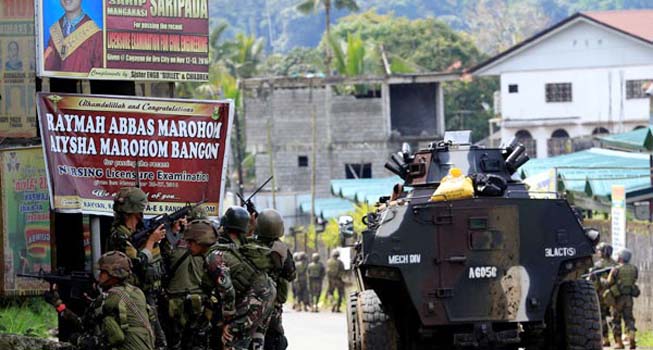Foto Serangan di Marawi, Seorang Warga Agam Dilaporkan Masuk DPO Polisi Filipina