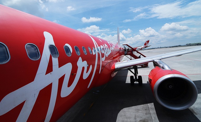 Foto Pemprov Minta Air Asia Hentikan Penerbangan Malaysia-Padang