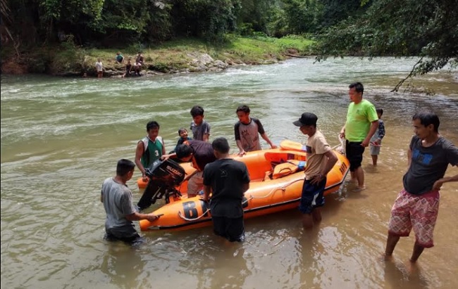 Foto Petugas Kebersihan Pasar di Dharmasraya Hilang Diduga Terseret Arus Sungai