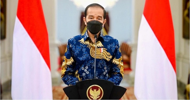 Foto Jokowi Minta Lukas Enembe Hormati Panggilan KPK